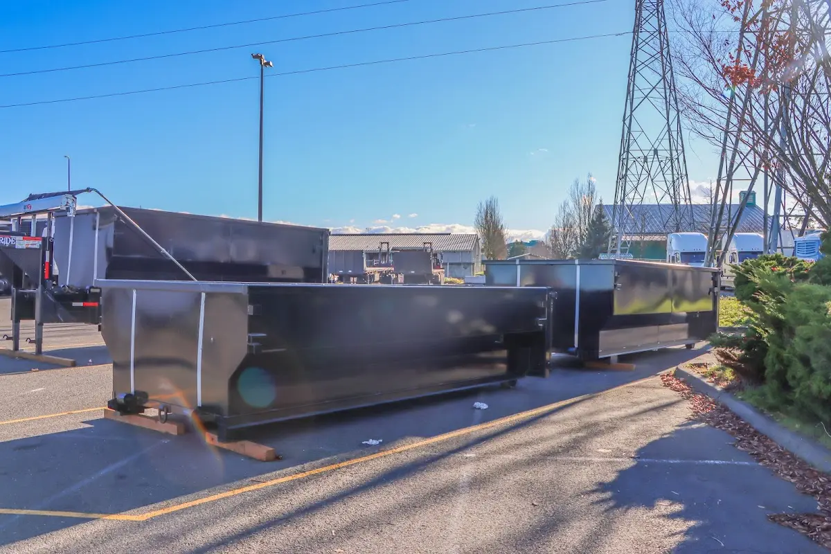 Roll-off dumpster ready for waste disposal at job site for Roll Off Dumpster Rental in Lenoir